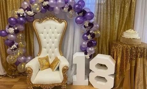 A white throne beside 18